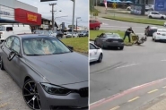 Briga no tr�nsito termina com BMW, moto e placa de sinaliza��o destru�das em Blumenau