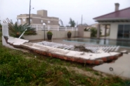 Tsunami meteorolgico destri ponte, derruba muros e atinge casas no Sul de SC