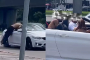 Assaltante pula dentro de BMW convers�vel em movimento e acaba preso em Florian�polis